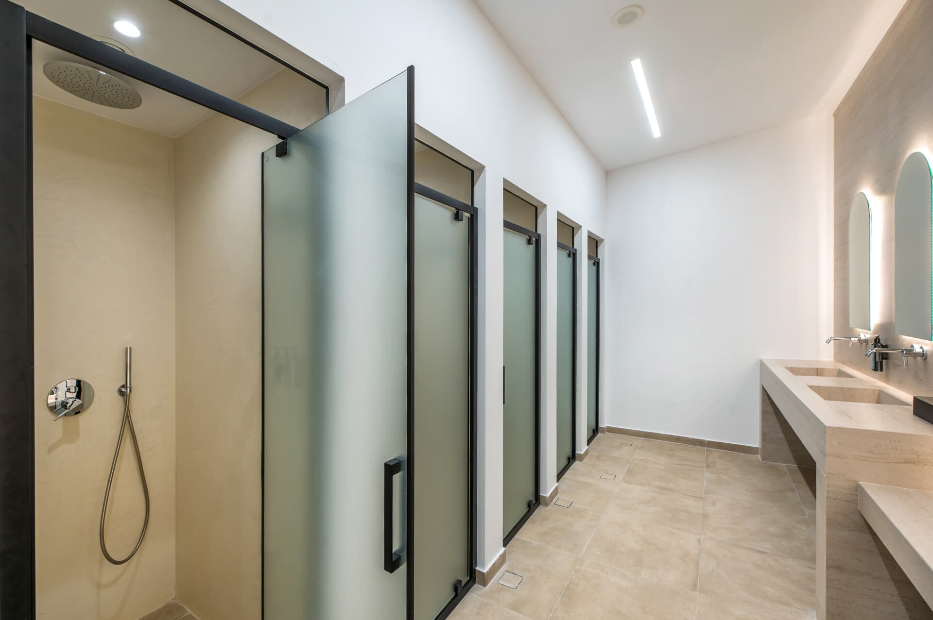 OAKA sports centre after the 2025 refurbishment — interior architecture detail.